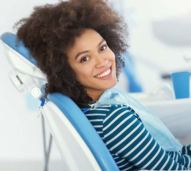 smiling woman at the dentist