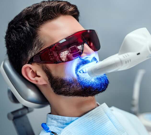 man having his teeth whitened